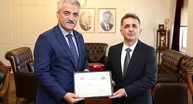 Tuğgeneral Mustafa Tetik'e başarı belgesi