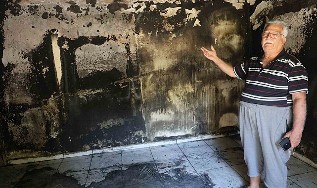 Yaşlı çiftin alevlere teslim olan 40 yıllık evlerinden geriye camı renklendiren çiçekleri kaldı