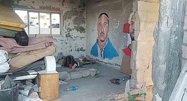 Gazze'de bir sanatçı daha, Filistin'i destekleyen ABD'li rapçi Macklemore'un duvar resmini yaptı