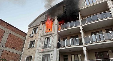 Iğdır'da itfaiye erleri çevresi kapalı olan binadaki yangına güçlükle müdahale etti