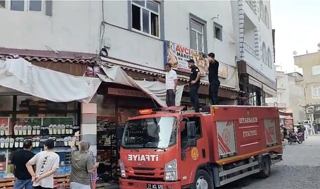 İş yerinde mahsur kalan kedi için itfaiye ekipleri seferber oldu
