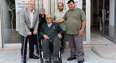 Türkiye Sakatlar Derneği Bafra Şubesi'nden şehit babasına akülü sandalye hediyesi