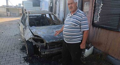 Depremzede vatandaş, camını kaldırım taşıyla kırdıkları otomobilini çalıştırırken yaktıklarını iddia etti