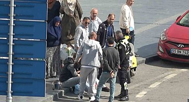 Kavşakta motosiklet devrildi, sürücü ve yolcu yere sürüklendi