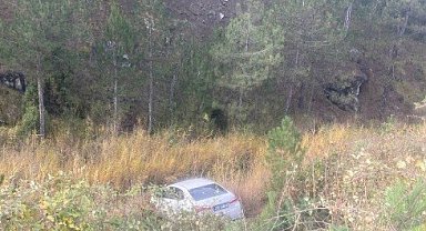Tavşanlı'da dere yatağına devrilen otomobilin sürücüsü yaralandı
